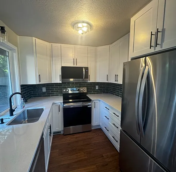 Brand new appliances and granite counters