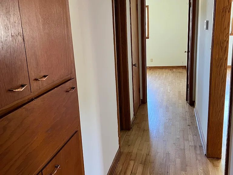 Hallway, with storage cabinets