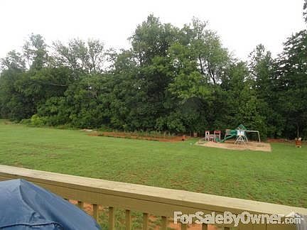 View from Back Deck
						:
						Large back yard with treeline for privacy