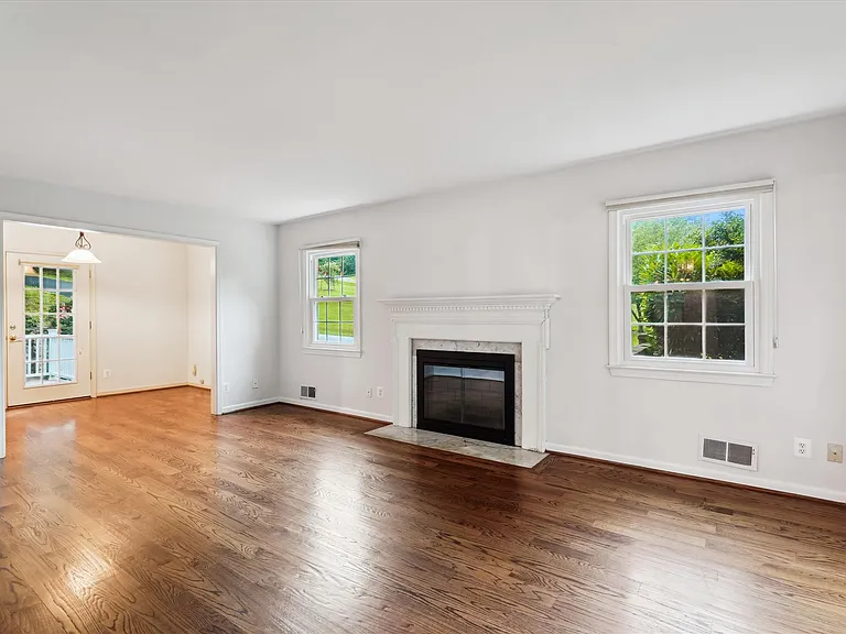 Lots of natural light with wood burning fireplace