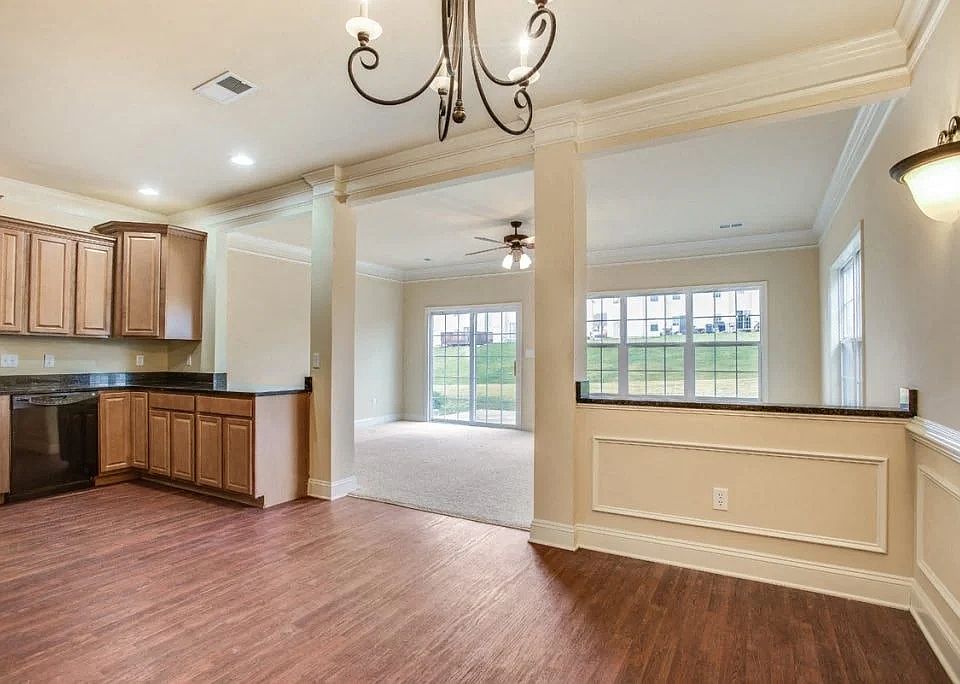 This open floor plan kitchen and dining area flows naturally into the connected living area, ideal for everyday living and entertaining.