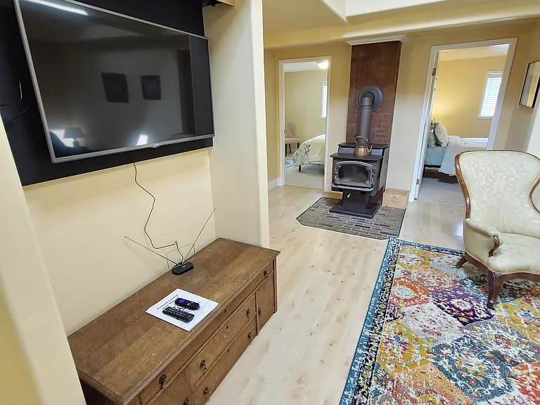 Airy living room with Roku TV, WiFi and comfy furniture.