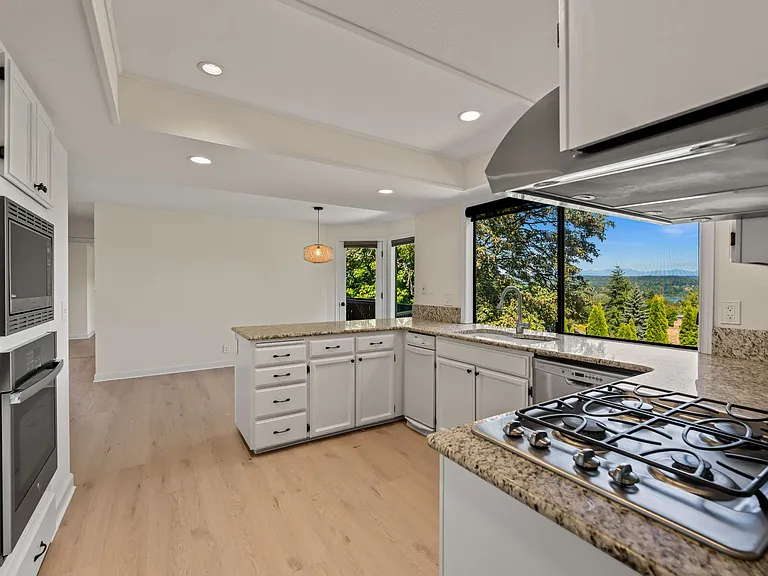 Kitchen with view of lake and mountains