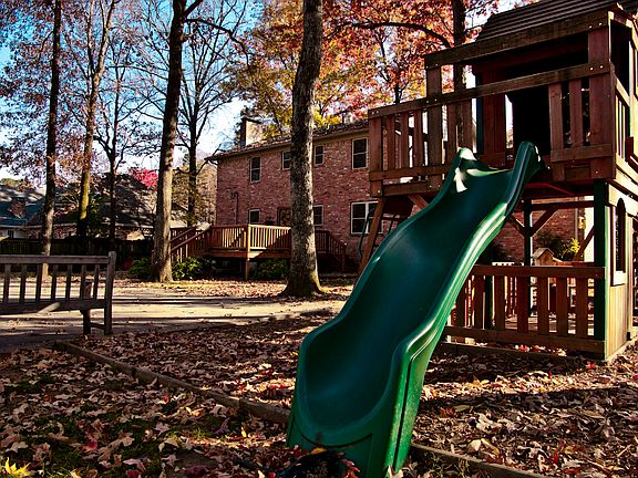 back w/playground & concrete
