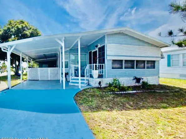 701 Gladiolus Dr, Barefoot Bay, FL 32976