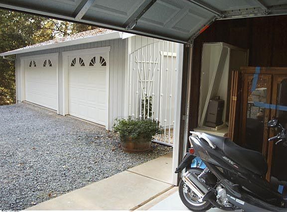 Attached Garage looking at additional shop