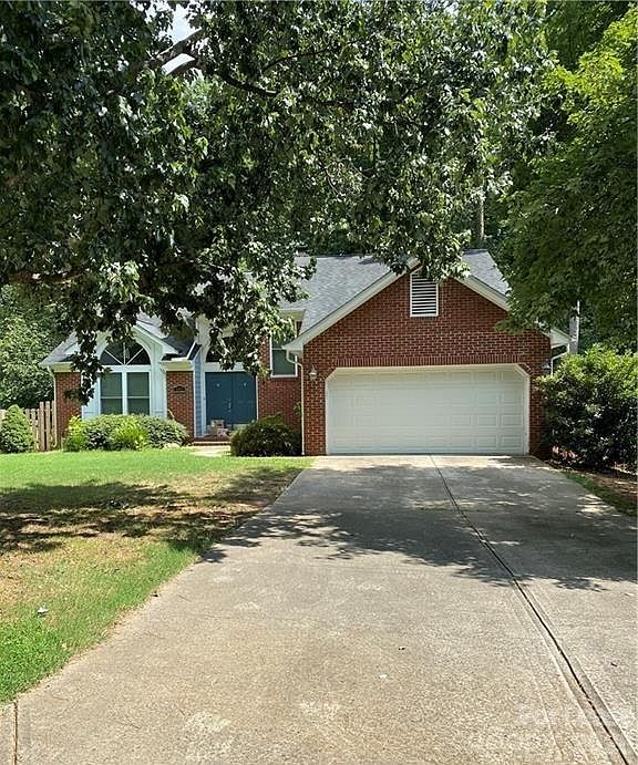 Privacy, large fenced yard, 2 house over from community pool & Clarks Creek Greenway, primary on main, 3 BR, plus loft 2 1/2 baths - open plan, granite, hardwoods on main, open floor plan 1816 sq. ft.