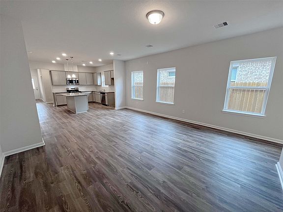 The Mockingbird II- Family Room into the Kitchen Sample Photo, options and colors to vary