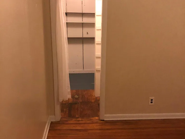 The view from the bedroom into the closet.