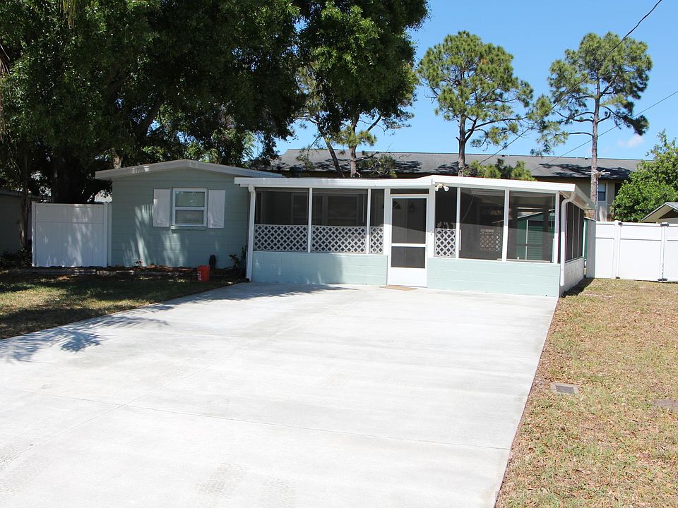 Front Yard and Large Driveway.