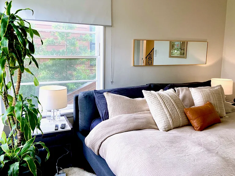Bedroom shown furnished to illustrate layout and room size.