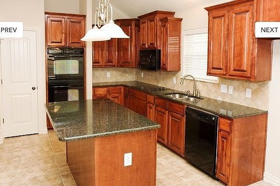 Kitchen that opens to living room