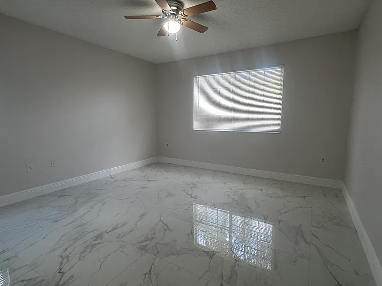 5011 Wiles Rd #207 — Photo 13