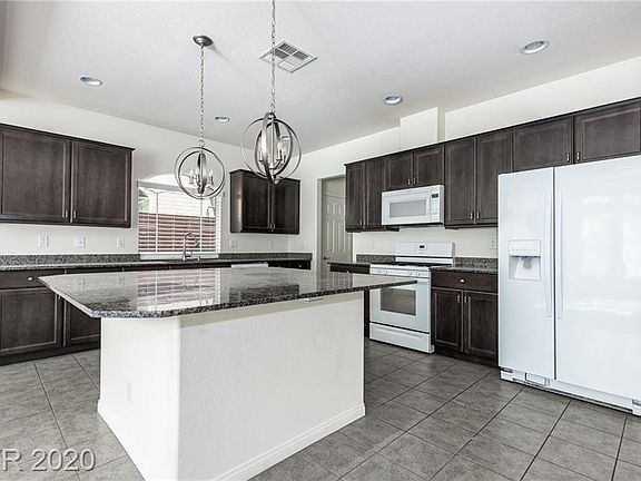 5th image of 5947 Azzura Palms Ave