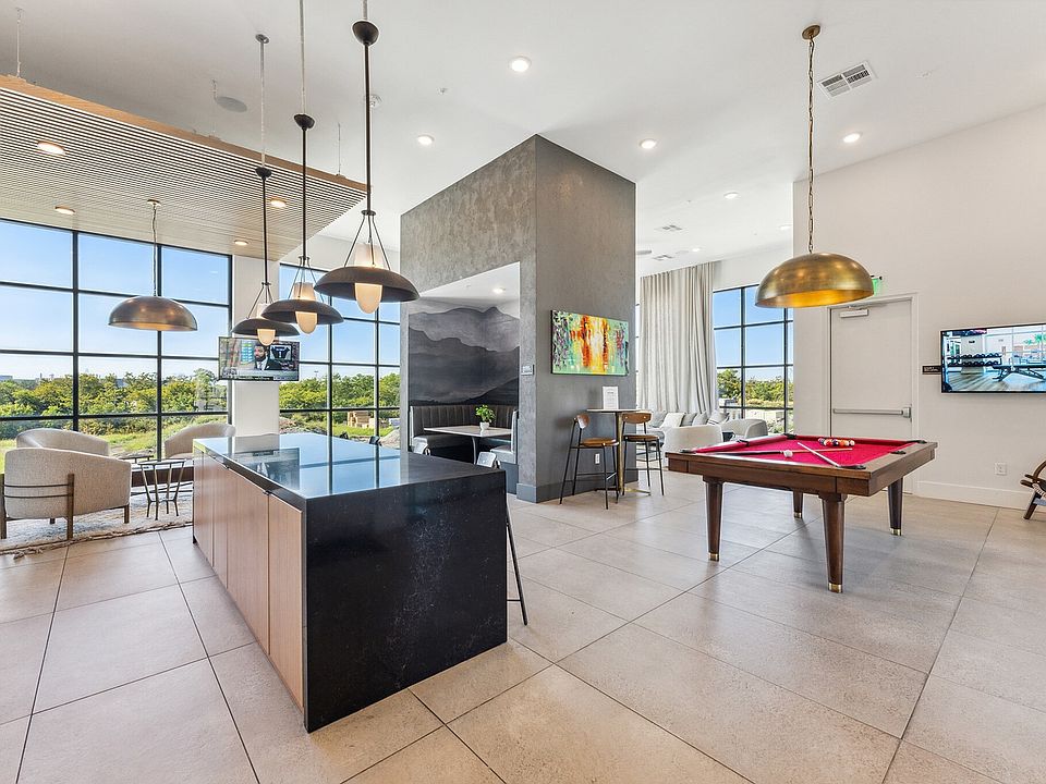 Relax in our clubhouse with great views at Latitude Apartments