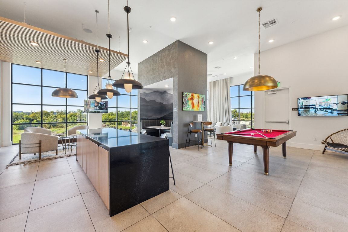 Relax in our clubhouse with great views at Latitude Apartments