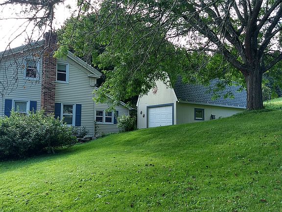 Home & 2 story garage. 