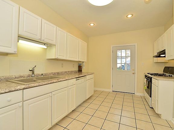 Kitchen with door to backyard