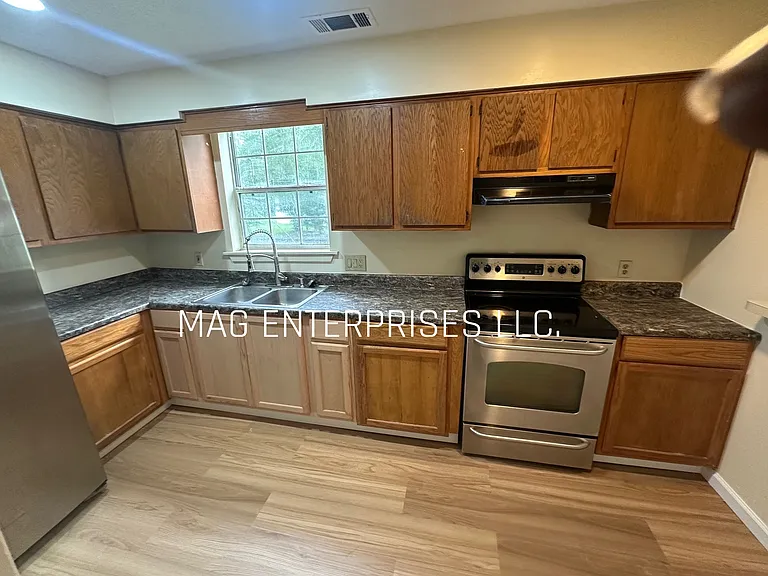 303 Mewborn St — Photo 3