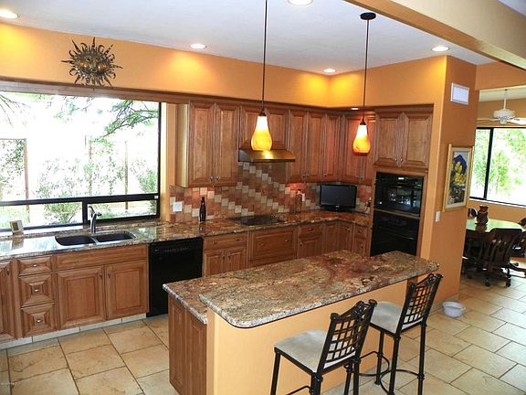 4th image of 7841 N Tuscany Dr