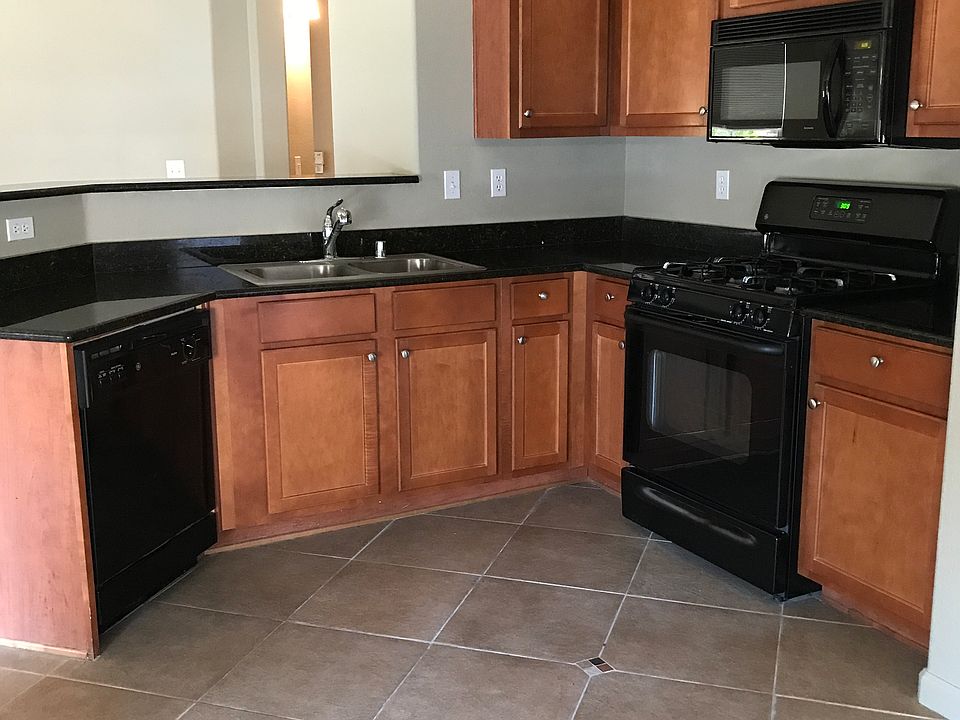 KITCHEN WITH GRANITE/TILE FL