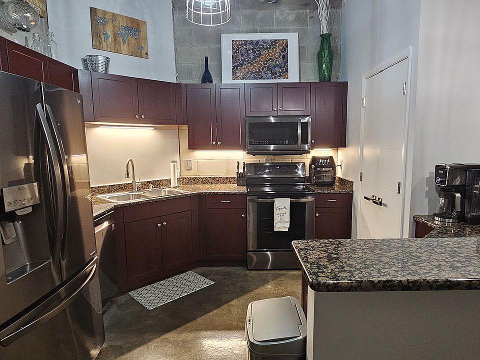 Kitchen includes LG refrigerator, range, microwave, and dishwasher. Also included are an airfryer and Ninja premium coffee maker (for carafes and K-cups)