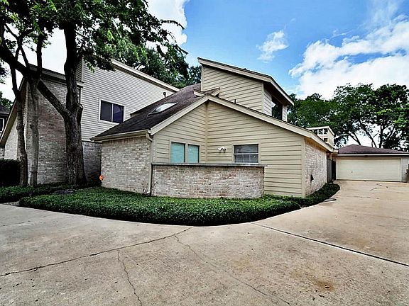 Circle driveway, detached garage, & cul de sac location offer ample room to park