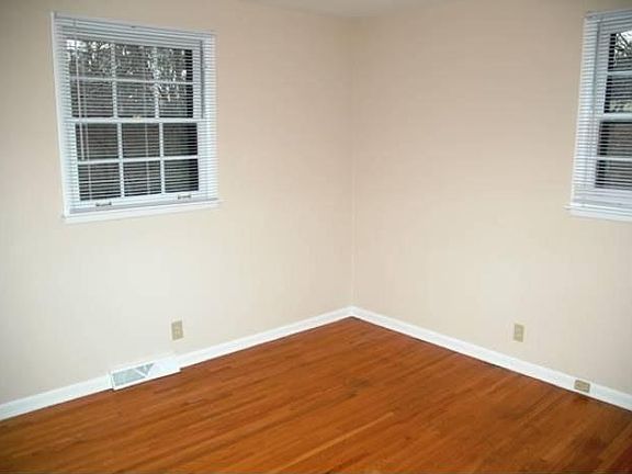 3 Bedrooms all have Hardwood Floors. Master has its own Half Bath