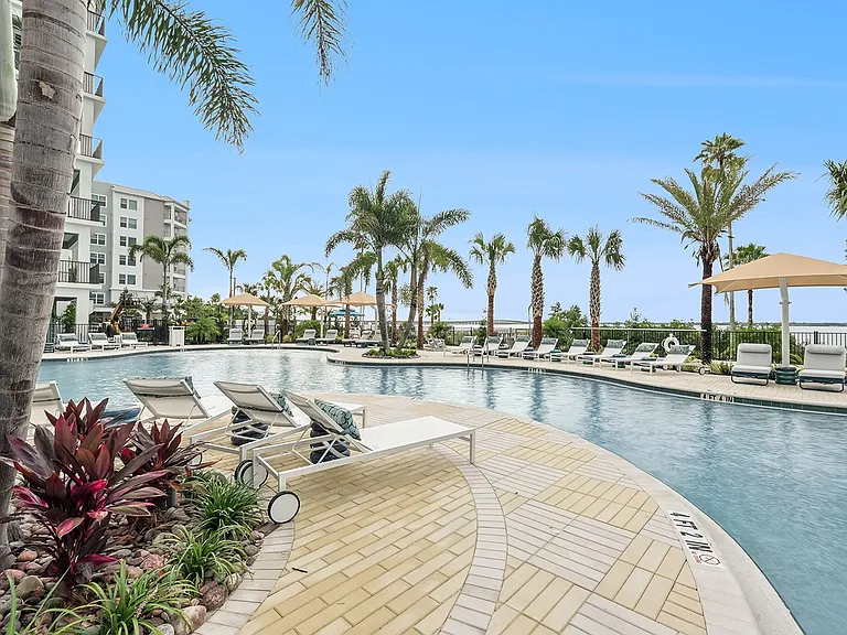 Resort-Style Pool with Sun Shelf and Grilling