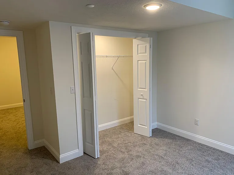 Bedroom 3 closet looking to Extra TV Room