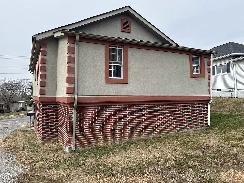Rear of 214 E. Ravine property.
Parking is available for tenants and guests in large area in rear of building