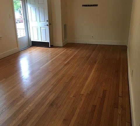 Living room with refinished wood floors