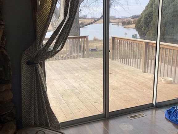 Slider off dining area onto a extra large deck and patio....not to mention an awesome view to wildlife and neighboring farmer's beautiful pond!
