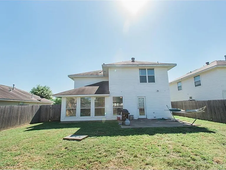 huge fenced back yard