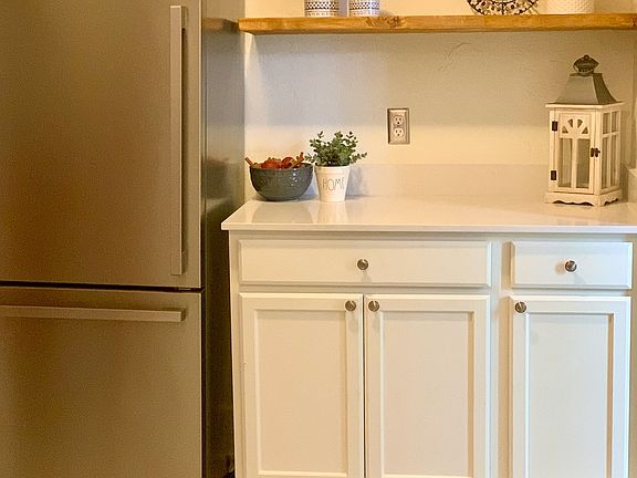 Coffee nook next to new refrigerator