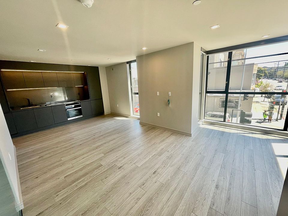 Designer Kitchen flowing into the light-filled Great Room