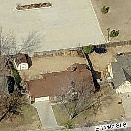 View from Satelite - backs to church. Large Yard. Roomy storage shed.
