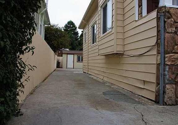 Large side yard for ample parking