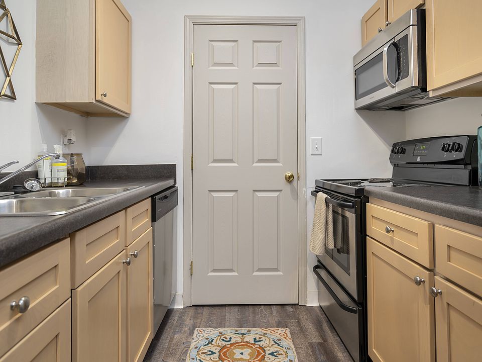 Step into a thoughtfully designed kitchen with a practical layout that makes cooking and entertaining a breeze.