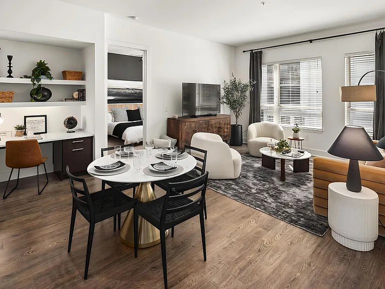 Living Room and Dining Table With Built-In Desk and Bedroom Entry