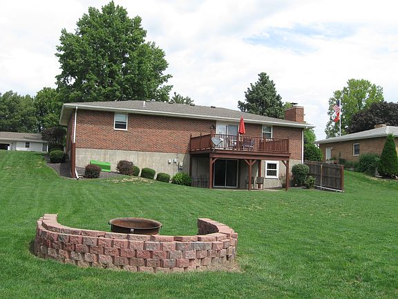 Large backyard with firepit