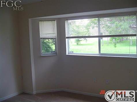 Master bedoroom with lots of windows.
