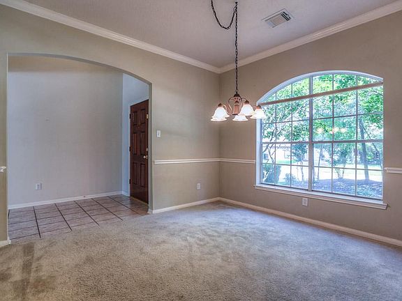 Dining room overlooking front lawn.