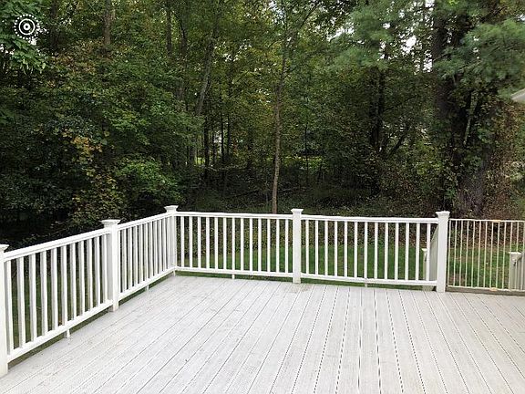 16' x 20' maintenance free deck, located off rear kitchen sliding glass door.
