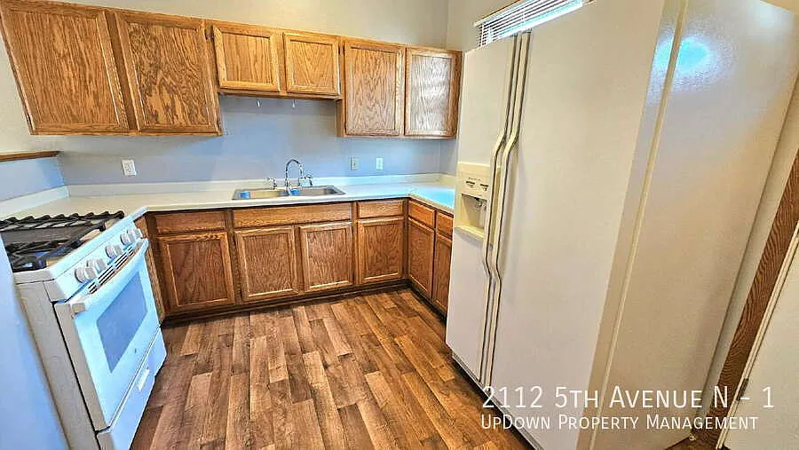 "Charming 3-Bedroom Retreat with 1200 Sq Ft of Comfort in Harrison Neighborhood in Minneapolis!" — Photo 4