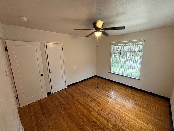 Master Bedroom (featuring new window treatments as well as new ceiling fan)