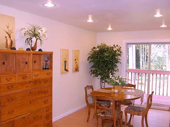 Dining Room off Kitchen with Slider to rear deck and back yard. 