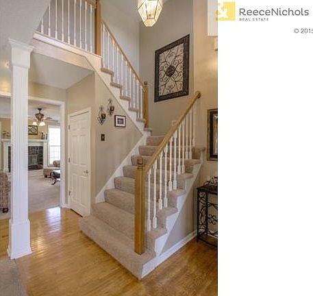 Step inside to the 2 story entry with harwood floors.  The Forma