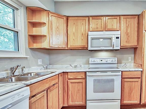 New Kitchen Sink, Faucets, Dishwasher and countertop! Start your cooking