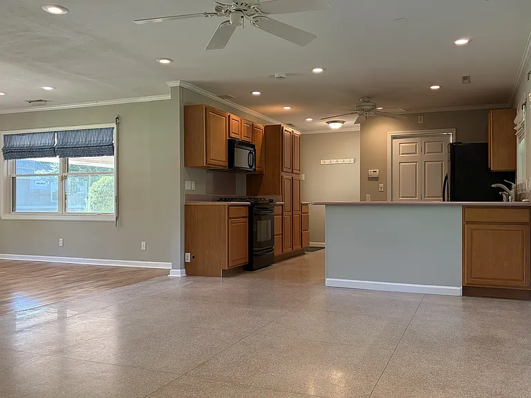 Bright dining space seamlessly connected to the living room and kitchen, creating an ideal open flow for everyday living.